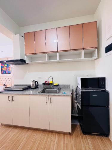 Η κουζίνα ή μικρή κουζίνα στο Tulip Garden Condominium Southwoods