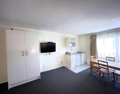 Kuchyň nebo kuchyňský kout v ubytování Royal Park Lodge
