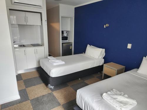 Postel nebo postele na pokoji v ubytování Albion Hotel