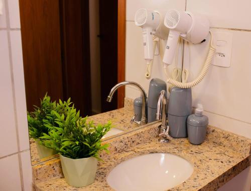 Billede fra billedgalleriet på Apto Ibiza Praia & Piscina - Conforto e Estilo i Luís Correia