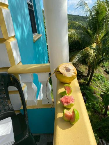 a porch railing with some food on it at My local secret guesthouse in Salisbury