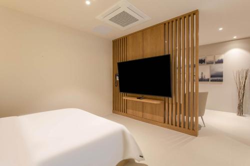 TV a/nebo společenská místnost v ubytování 양주 무인텔 호텔그리다 Hotel Grida