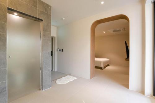 Postel nebo postele na pokoji v ubytování 양주 무인텔 호텔그리다 Hotel Grida