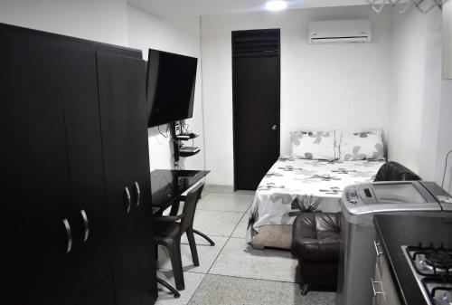 TV a/nebo společenská místnost v ubytování San Luis Apartamento 101 Cúcuta
