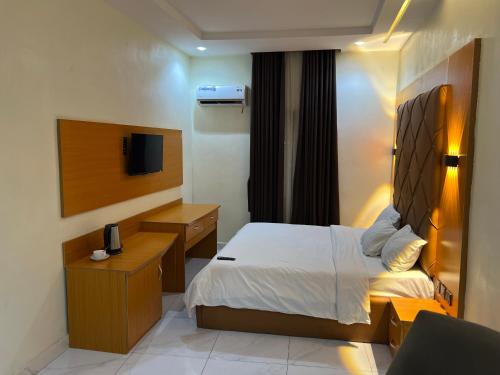 Postel nebo postele na pokoji v ubytování Chapy Hotels