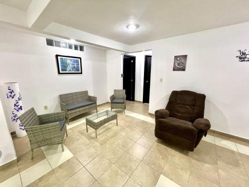 Χώρος καθιστικού στο Habitación Rosedal 11