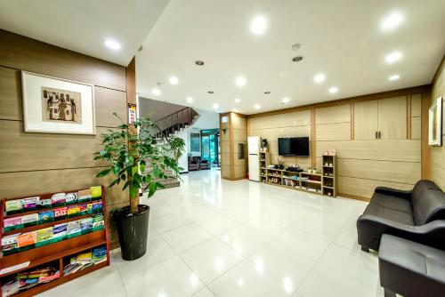 The lobby or reception area at Beach Story Hotel