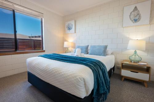 Postel nebo postele na pokoji v ubytování Blue Seas Holiday Villas