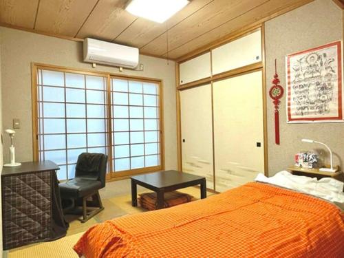 Postel nebo postele na pokoji v ubytování OSO Homestay