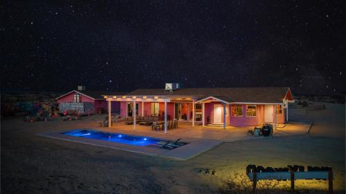 a house at night with a starry sky at Beyond: Historic Rock & Roll Studio in Sunfair Heights