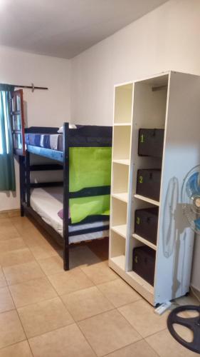 Ένα ή περισσότερα κρεβάτια σε δωμάτιο στο Huaka Hostel and Guest house