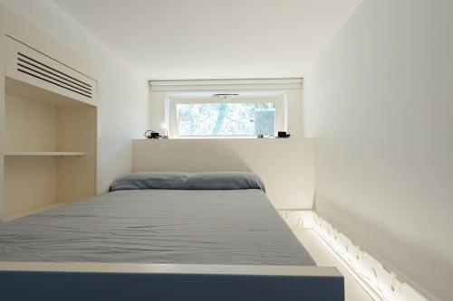 Giường trong phòng chung tại Luxury Villa Civico 27 - Capri Centro