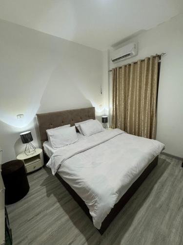 Katil atau katil-katil dalam bilik di Hotel Apartment in Madinaty Prevado