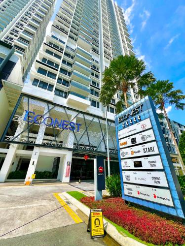 a large building with a sign in front of it at EcoNest 3Bedroom Family Apartment 8px Near Legoland in Iskandar Puteri
