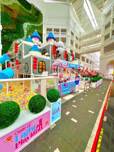 a carnival exhibit in a mall with a play park at EcoNest 3Bedroom Family Apartment 8px Near Legoland in Iskandar Puteri