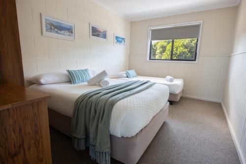 Postel nebo postele na pokoji v ubytování Blue Seas Holiday Villas