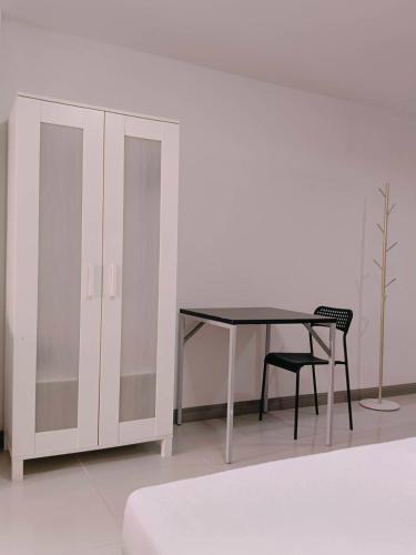 Postel nebo postele na pokoji v ubytování Convenient Resort
