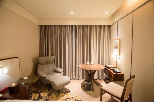 Posezení v ubytování 威海卫大厦 Weihaiwei Hotel
