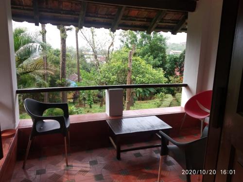 Μπαλκόνι ή βεράντα στο The Lodge, Madikeri