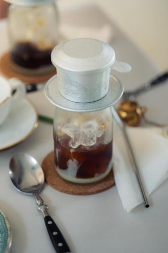 a jar of food sitting on a table with spoons at Prince of Galle (inside the Fort) in Galle