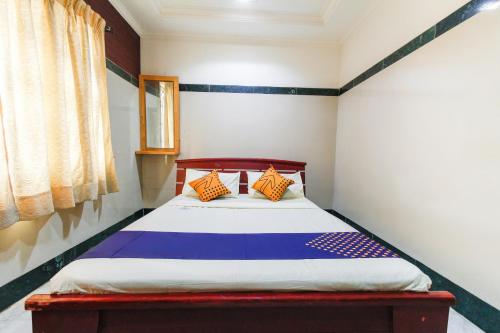Katil atau katil-katil dalam bilik di Hotel O S President