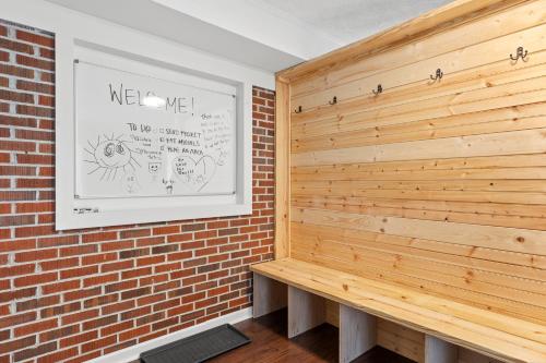 a wooden wall in a room with a wall at Grey Duck in Beattyville