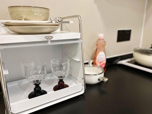 Η κουζίνα ή μικρή κουζίνα στο Yish Cinema Serviced Apartment B&B