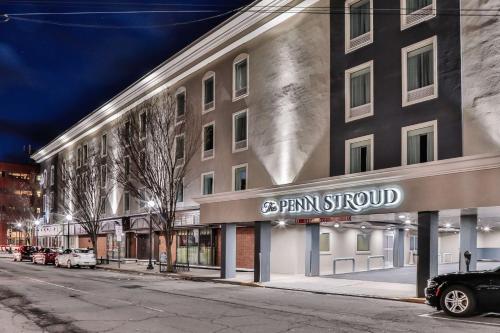 a building with a sign on the side of a street at The Penn Stroud, Stroudsburg - Poconos, Ascend Hotel Collection in Stroudsburg