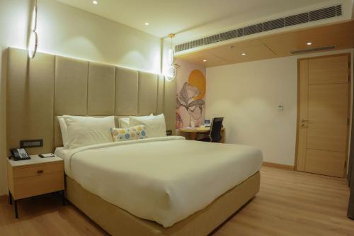 Postel nebo postele na pokoji v ubytování Best Western AH1 Amritsar