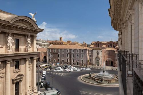 a view of a street in a city with buildings at Anantara Palazzo Naiadi Rome Hotel - A Leading Hotel of the World in Rome
