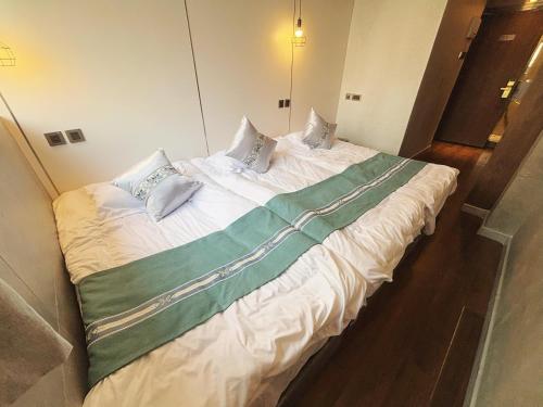 Cama o camas de una habitación en 王子公館King's mansion