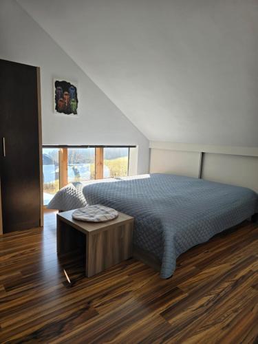 Postel nebo postele na pokoji v ubytování Apartment im Salzburger Seenland