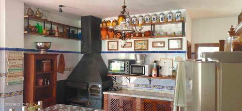 Loungen eller baren på Cortijo Los Arcos - Lujo rural con piscina y vistas espectaculares en Málaga