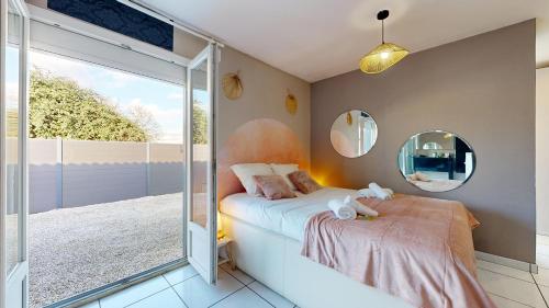 Ένα ή περισσότερα κρεβάτια σε δωμάτιο στο expat renting - Le Corail - Villa - Piscine - Wifi