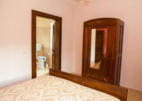 A bed or beds in a room at Il Casale Della Regina