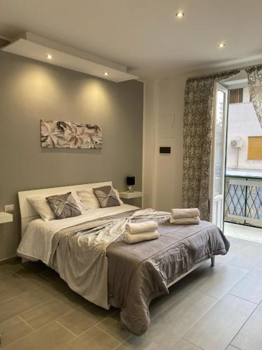 Ένα ή περισσότερα κρεβάτια σε δωμάτιο στο LA CASA DI FraEmily , PALERMO
