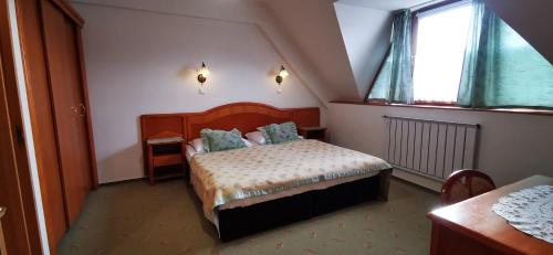 Ágnes Hotelにあるベッド