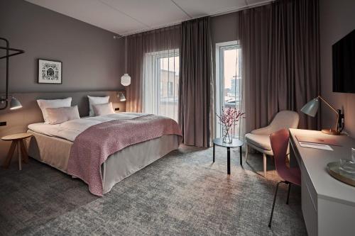Postel nebo postele na pokoji v ubytování Hotel Odeon