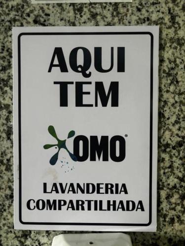 a sign on a wall that saysou temongaynchronousynchronousynchronousynchronousynchronousynchronous at Via Park Flat PARAÍSO in Campos dos Goytacazes