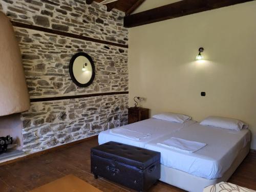 Cama o camas de una habitación en Rustic House