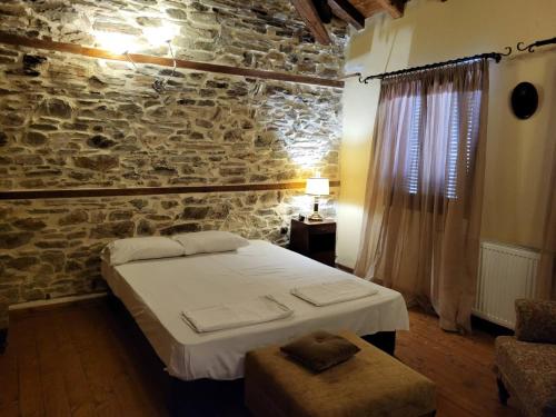 Cama o camas de una habitación en Rustic House