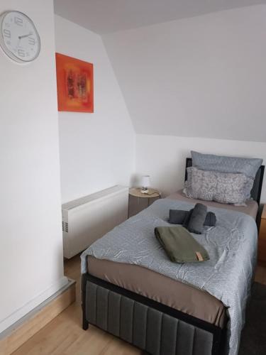 Кровать или кровати в номере Privatzimmer Landblick