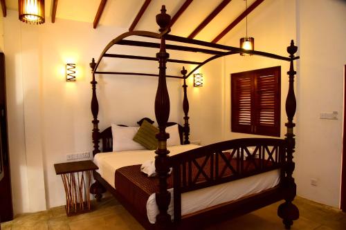 Katil atau katil-katil dalam bilik di Dinuda Villas - Kalpitiya