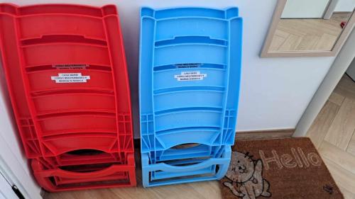 two plastic trays sitting next to each other at Casa Marie in Marina di Modica