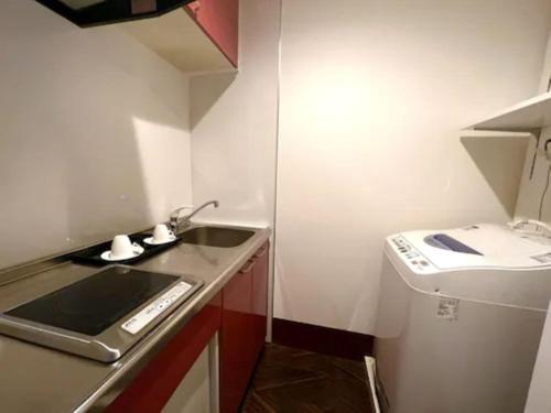 Η κουζίνα ή μικρή κουζίνα στο Centurion Hotel Residential Akasaka Station