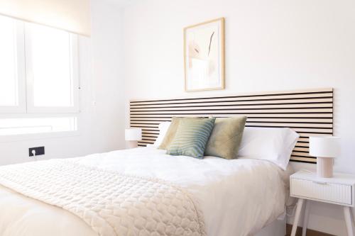 Ένα ή περισσότερα κρεβάτια σε δωμάτιο στο Apartamentos Yakka