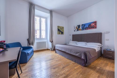 Postel nebo postele na pokoji v ubytování Rome Armony Suites