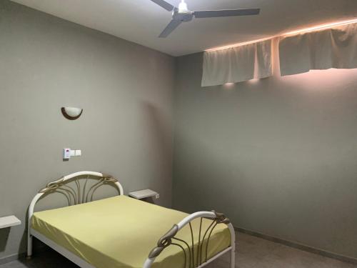 Postel nebo postele na pokoji v ubytování Casa Amarela