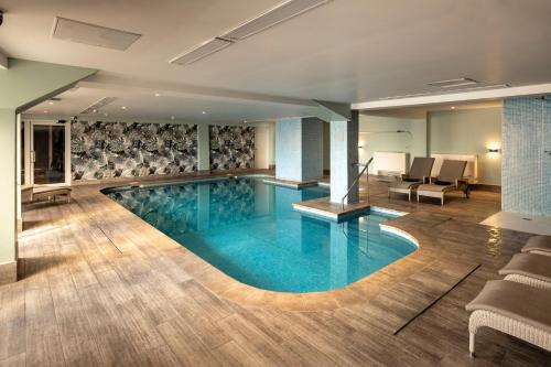 a pool in the middle of a hotel room at Waterfront in Sliema
