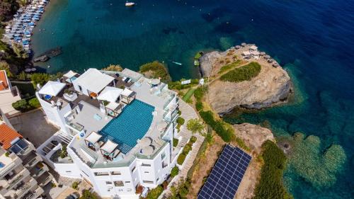 an aerial view of a house next to the ocean at Blue Bay Lifestyle - ex Bali Blue Bay in Balíon